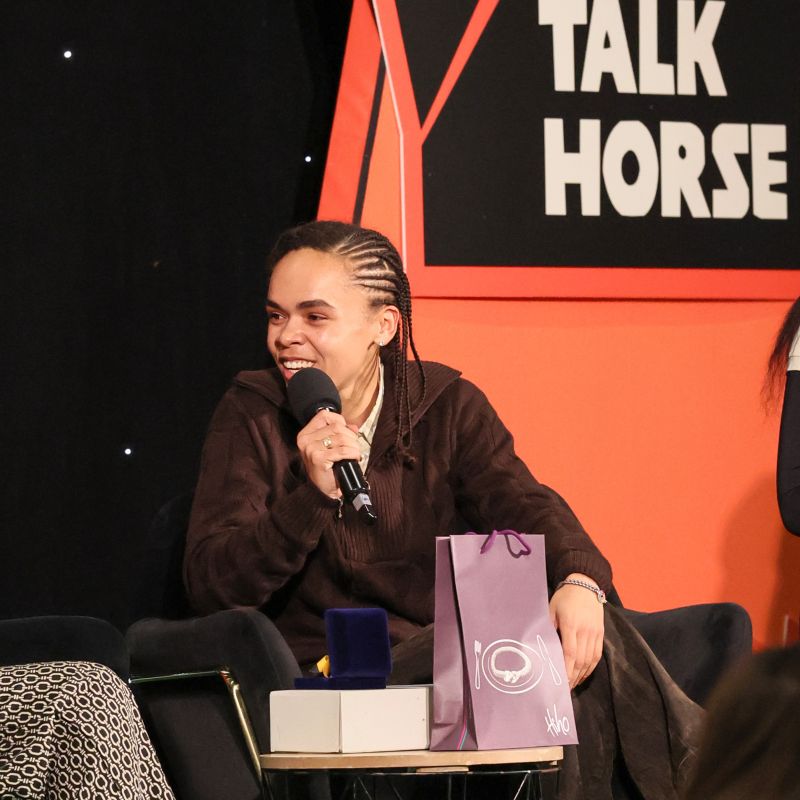 Lydia speaking on the mic